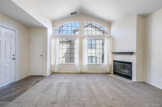 2172 Denton Grv Unit 203, Colorado Springs, CO 80919 - unfurnished living room with carpet flooring, a healthy amount of sunlight, and visible vents