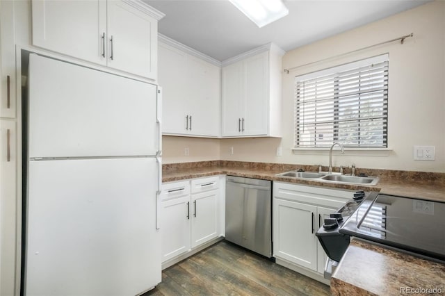 2172 Denton Grv Unit 203, Colorado Springs, CO 80919 - kitchen with a sink, freestanding refrigerator, white cabinetry, stainless steel dishwasher, and dark wood-style floors
