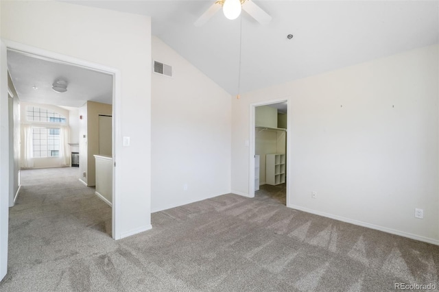 2172 Denton Grv Unit 203, Colorado Springs, CO 80919 - carpeted spare room featuring visible vents, baseboards, lofted ceiling, and ceiling fan