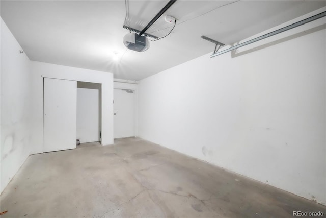 2172 Denton Grv Unit 203, Colorado Springs, CO 80919 - garage featuring a garage door opener