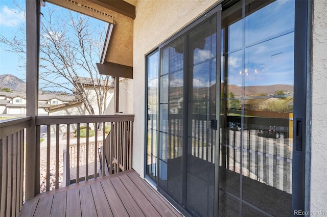 2172 Denton Grv Unit 203, Colorado Springs, CO 80919 - wooden deck featuring a mountain view