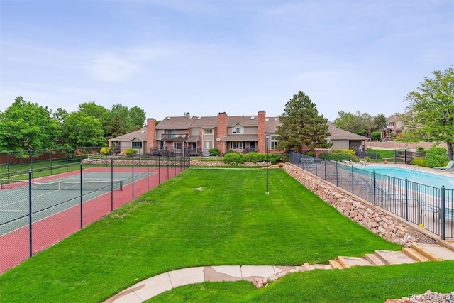 4231 S Fairplay Cir # E, Aurora, CO 80014 - view of community with a tennis court
