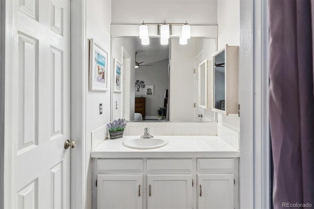 4231 S Fairplay Cir # E, Aurora, CO 80014 - ensuite bathroom with ceiling fan and vanity