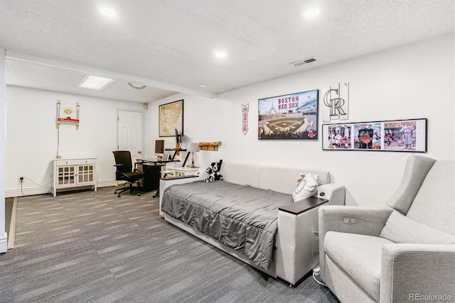 4231 S Fairplay Cir # E, Aurora, CO 80014 - carpeted bedroom featuring a textured ceiling, recessed lighting, a desk, and baseboards