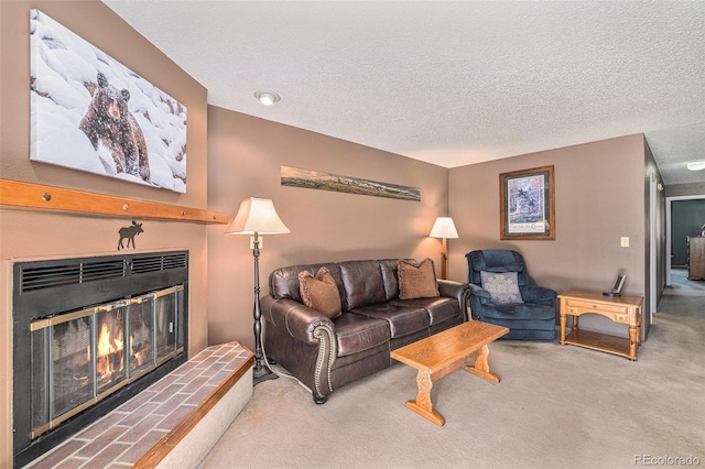 carpeted living room with a textured ceiling