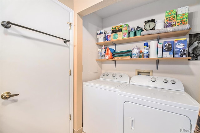 laundry room featuring separate washer and dryer