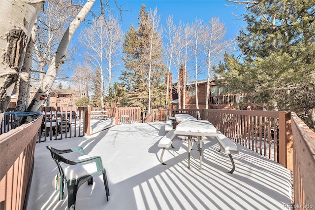 view of snow covered patio