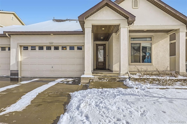 view of front of home with a garage