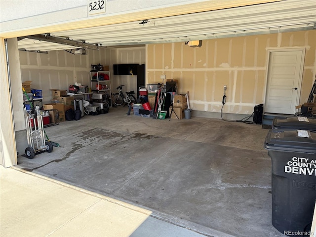 5232 Truckee St, Denver, CO 80249 - garage featuring a garage door opener