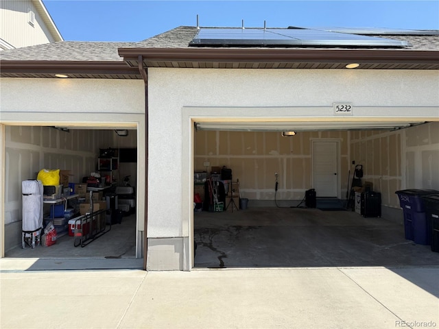 5232 Truckee St, Denver, CO 80249 - garage with concrete driveway and roof mounted solar panels
