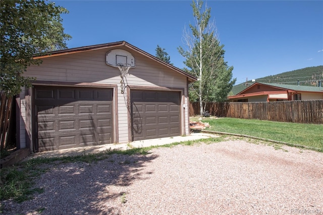 garage with a yard