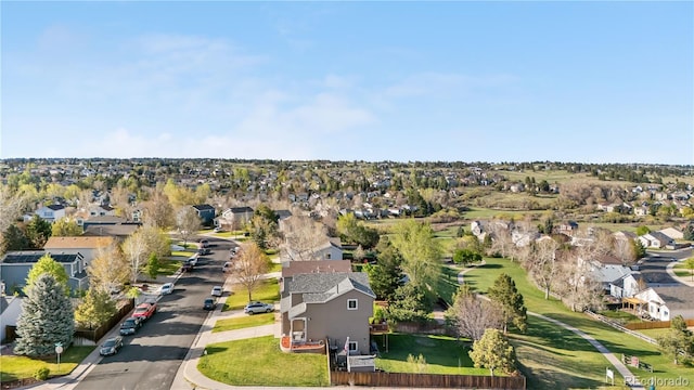 aerial overview of property's location featuring nearby suburban area
