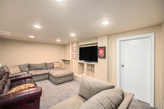 carpeted living room featuring recessed lighting