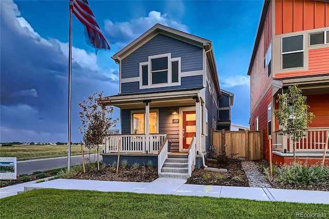 6309 N Hanover St, Denver, CO 80238 - view of front of home featuring covered porch and board and batten siding