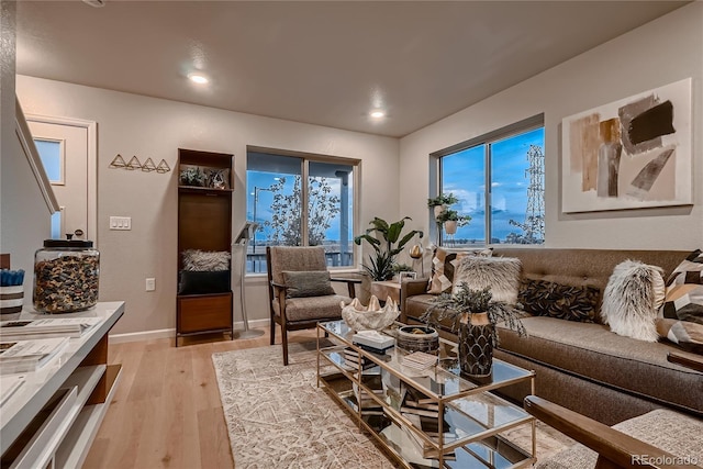 6309 N Hanover St, Denver, CO 80238 - living room featuring light wood-style flooring, recessed lighting, and baseboards