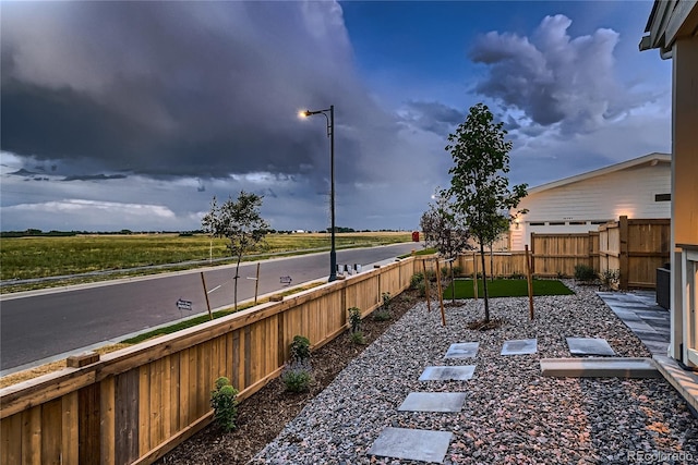 6309 N Hanover St, Denver, CO 80238 - fenced backyard featuring an attached garage