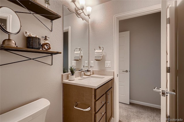 6309 N Hanover St, Denver, CO 80238 - bathroom with toilet and vanity
