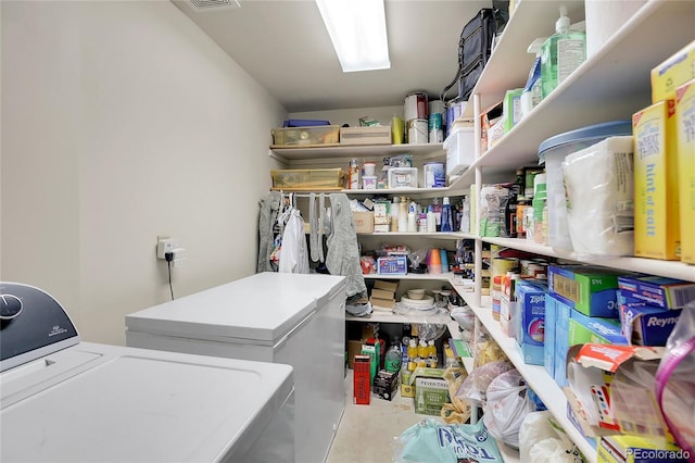 laundry area featuring washing machine and dryer