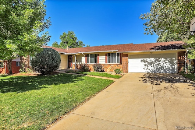 single story home with a garage and a front yard