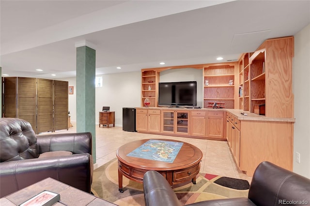 tiled living room with built in shelves