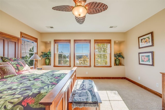 carpeted bedroom with ceiling fan