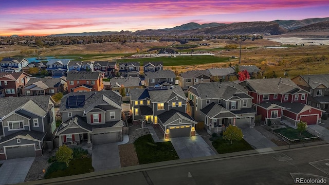 aerial view at dusk with a mountain view