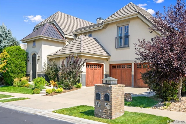 view of front of property featuring a garage