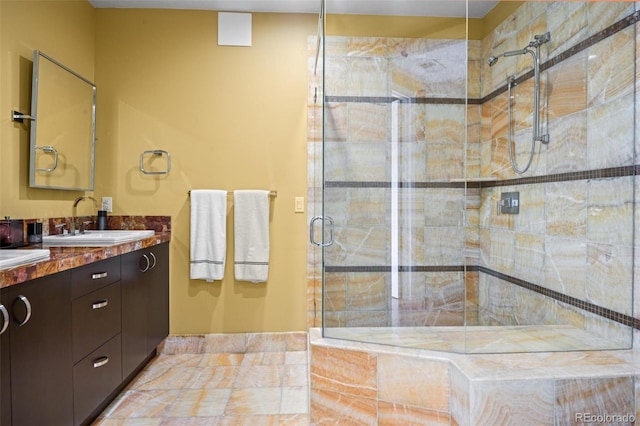 bathroom with vanity and an enclosed shower