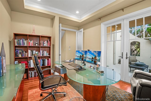 office space with recessed lighting, a raised ceiling, crown molding, and french doors