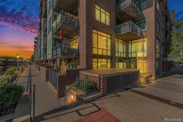 view of property at dusk