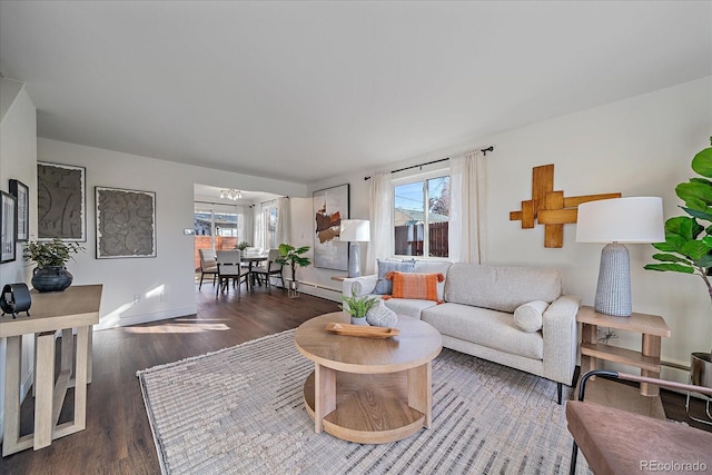 living room with dark hardwood / wood-style floors