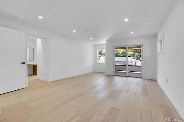 300 S Franklin St, Denver, CO 80209 - empty room featuring light wood-style flooring and recessed lighting