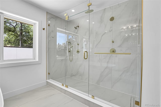 300 S Franklin St, Denver, CO 80209 - full bath featuring a marble finish shower, marble look tiles, and recessed lighting