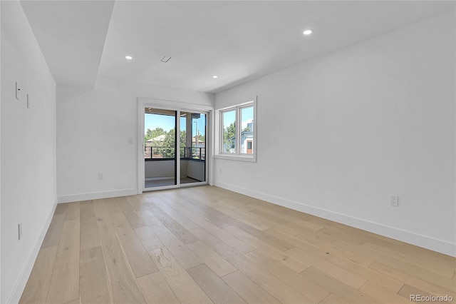 300 S Franklin St, Denver, CO 80209 - empty room with light wood-style floors and recessed lighting