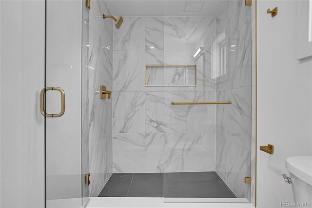 300 S Franklin St, Denver, CO 80209 - full bathroom featuring toilet and a marble finish shower