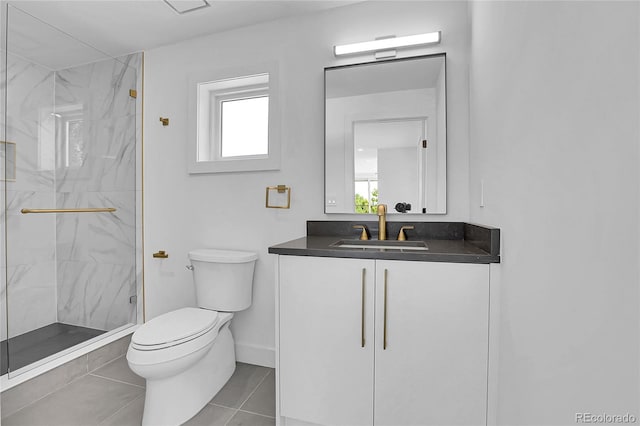 300 S Franklin St, Denver, CO 80209 - full bath featuring a marble finish shower, vanity, and tile patterned floors