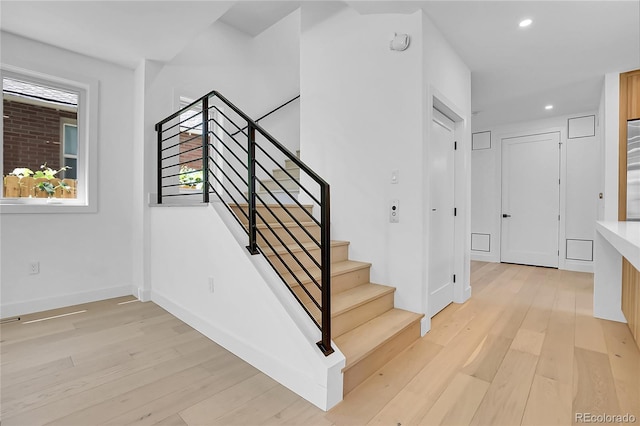 300 S Franklin St, Denver, CO 80209 - stairway featuring wood finished floors and recessed lighting