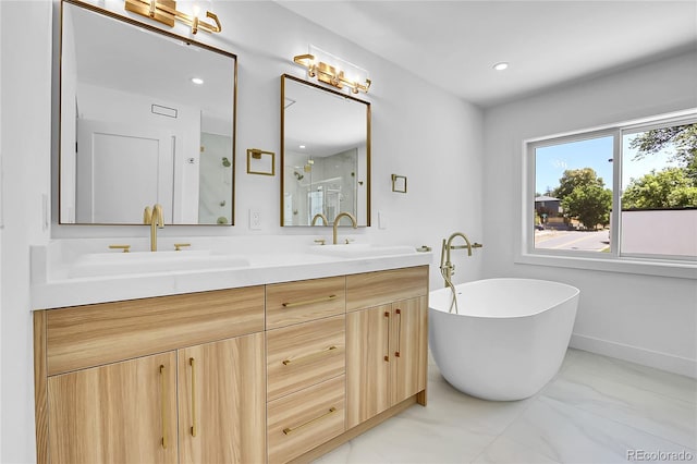 300 S Franklin St, Denver, CO 80209 - bathroom with double vanity, a stall shower, a freestanding bath, marble look tiles, and recessed lighting