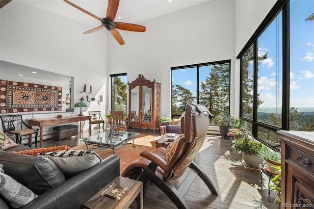 8453 S Scenic Dr, Morrison, CO 80465 - living room with a high ceiling, hardwood / wood-style flooring, ceiling fan, and recessed lighting