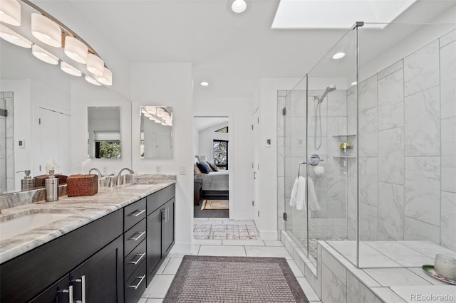 8453 S Scenic Dr, Morrison, CO 80465 - full bath featuring ensuite bathroom, recessed lighting, a shower stall, double vanity, and baseboards