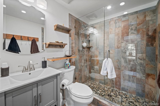 8453 S Scenic Dr, Morrison, CO 80465 - bathroom with recessed lighting, a shower stall, toilet, and vanity