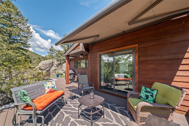 8453 S Scenic Dr, Morrison, CO 80465 - view of patio / terrace with a deck, a grill, and outdoor lounge area