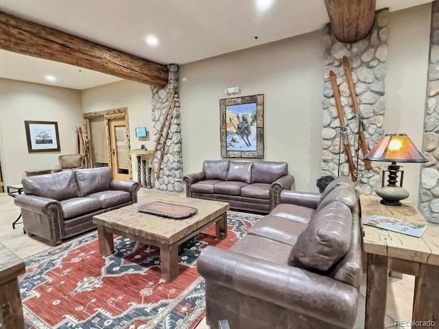 living room featuring beam ceiling