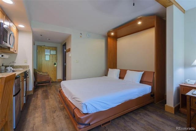 6 Emmons Rd Unit 515, Mount Crested Butte, CO 81225 - bedroom with dark wood-type flooring and recessed lighting