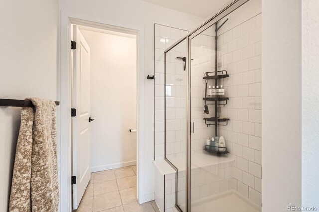 8433 Mount Kataka Loop, Littleton, CO 80125 - bathroom with a stall shower and tile patterned floors