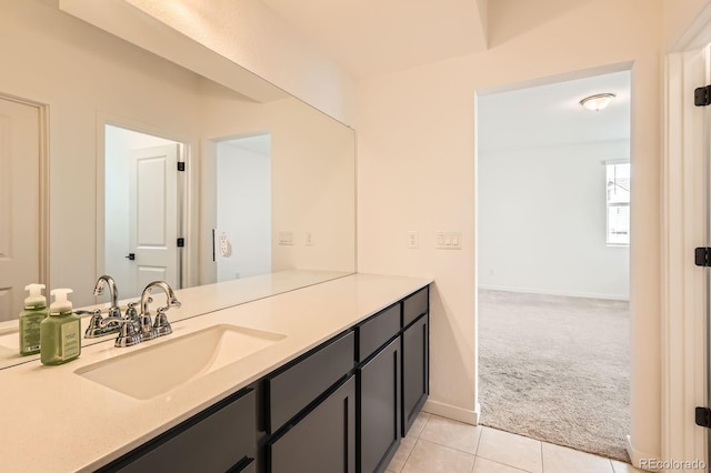 8433 Mount Kataka Loop, Littleton, CO 80125 - bathroom with tile patterned flooring, baseboards, and vanity