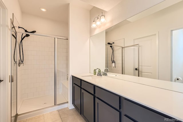 8433 Mount Kataka Loop, Littleton, CO 80125 - bathroom with vanity, tile patterned flooring, a shower stall, and recessed lighting