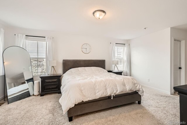 8433 Mount Kataka Loop, Littleton, CO 80125 - bedroom featuring carpet and baseboards