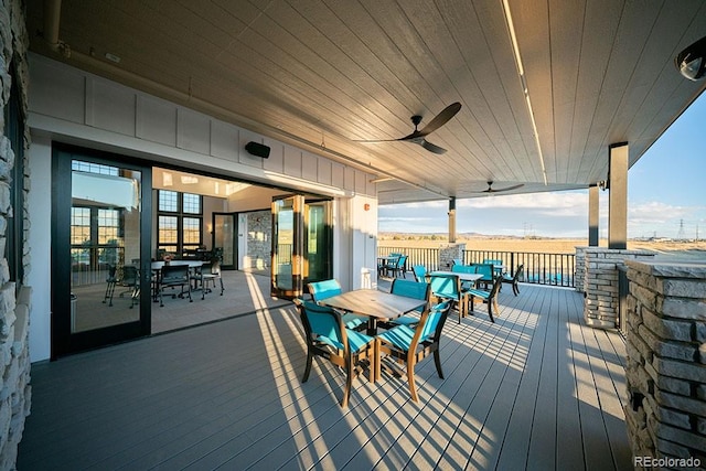 8433 Mount Kataka Loop, Littleton, CO 80125 - deck with ceiling fan and outdoor dining space