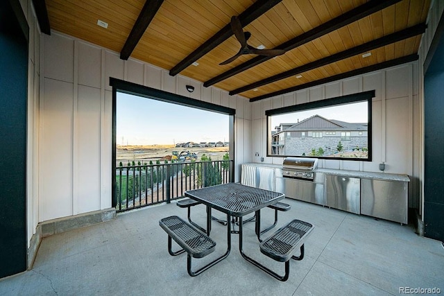 8433 Mount Kataka Loop, Littleton, CO 80125 - interior space with a ceiling fan, exterior kitchen, and grilling area
